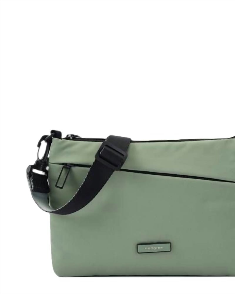 Front of a size O/S Orbit Flat Crossbody in Northern Green in Northern Green by Hedgren. | dia_product_style_image_id:330775